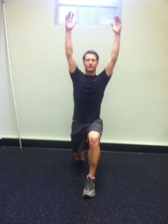 Start: Slow reverse lunge with arms up